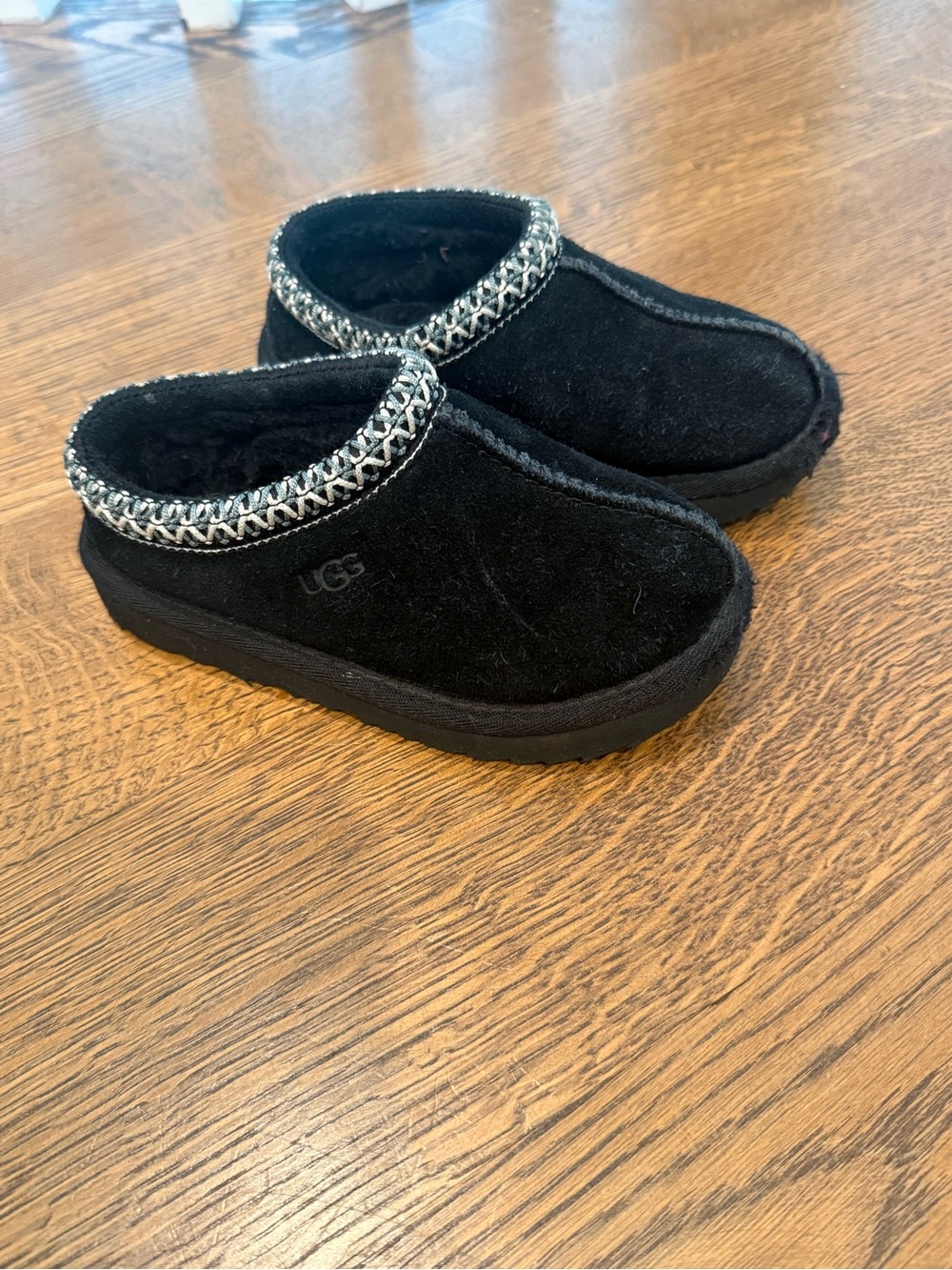 UGG Kids Black Slip-On Clog Slippers with Braided Trim